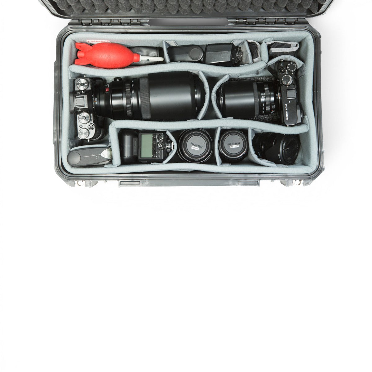 SKB Cases iSeries divider set with Nylex-wrapped foam inserts holding professional camera gear inside a hard case