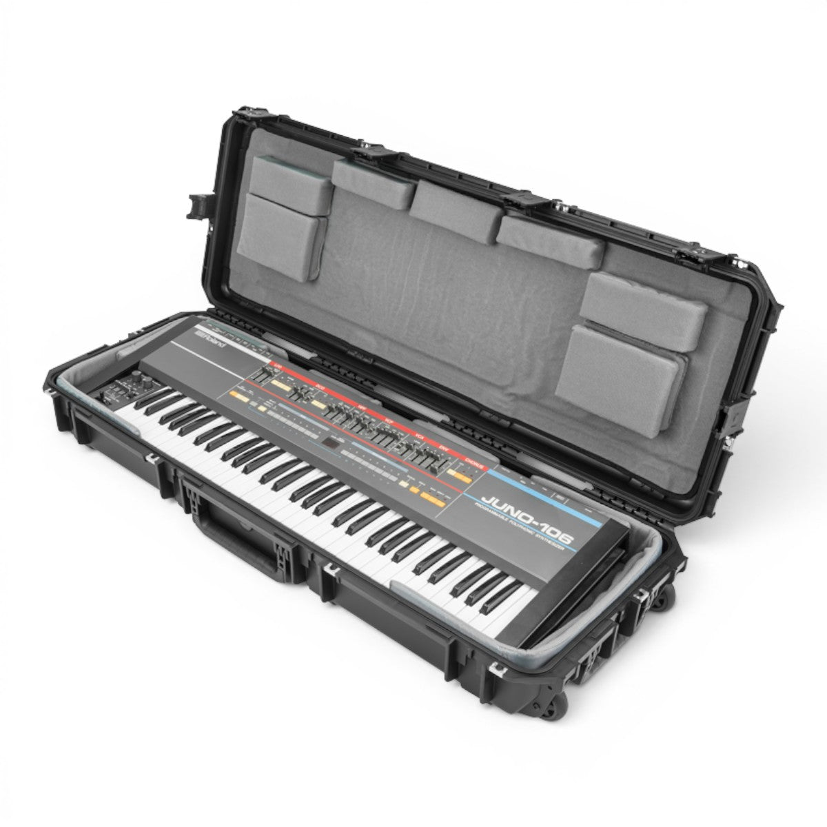SKB Cases iSeries 61-note keyboard case with a Roland Juno-106 inside, featuring customizable grey foam interior.
