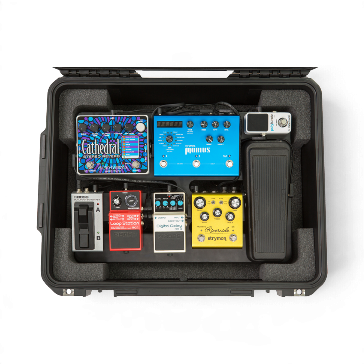 SKB Cases iSeries 2015-7 waterproof hard case containing a 1SKB-PB1712 pedalboard with various guitar effect pedals.