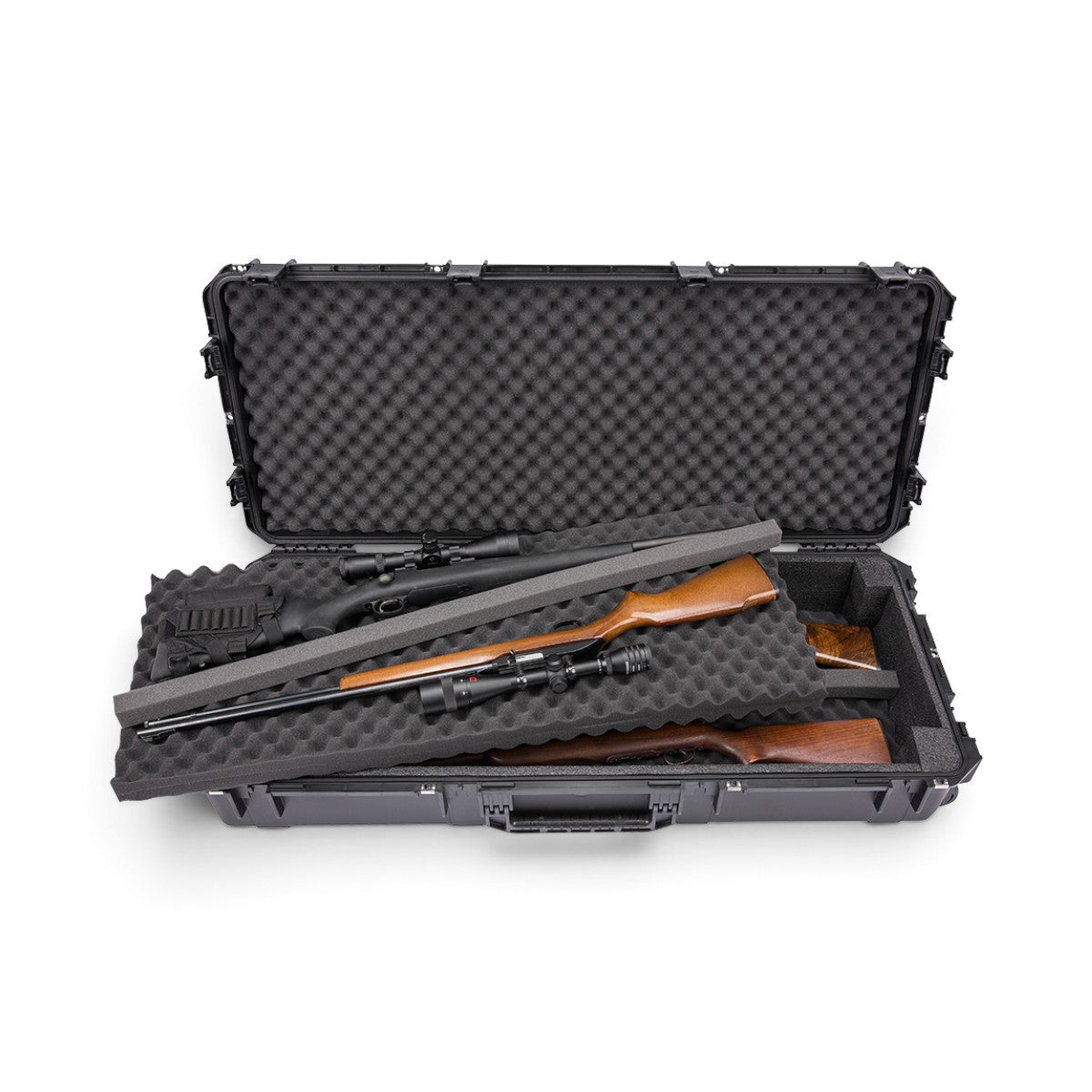 SKB Cases iSeries waterproof hard case with foam interior holding two rifles and a bow in a bunk-bed configuration.