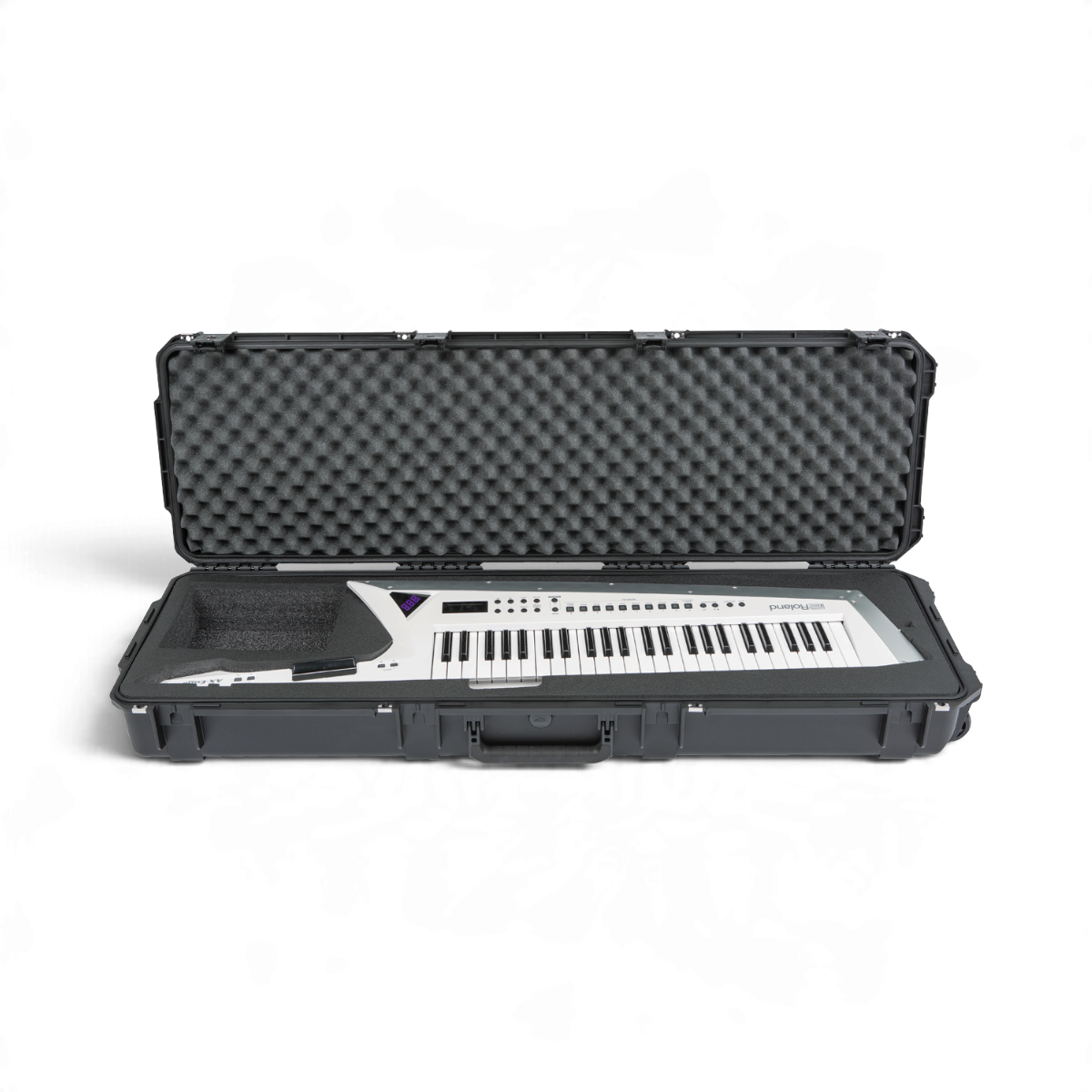 SKB Cases iSeries 5014-6 hard shell case containing a white Roland AX Edge keytar with protective foam interior