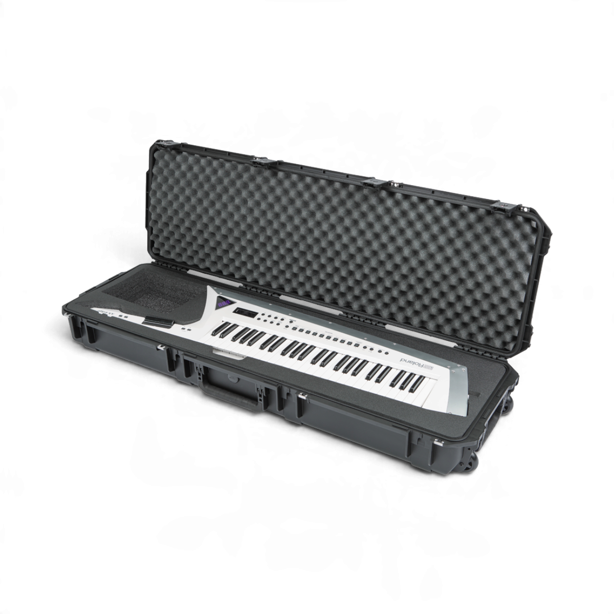 SKB Cases iSeries 5014-6 waterproof hard case containing a white Roland AX Edge keytar with protective foam interior