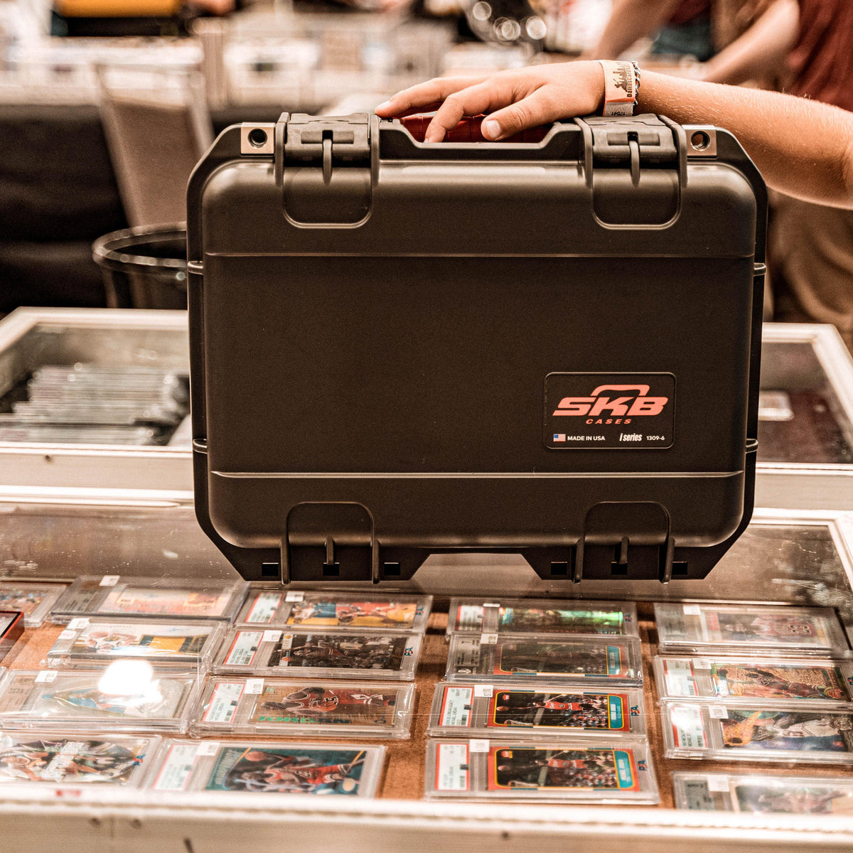 SKB Cases iSeries Slab 90 black waterproof hard case for sports card collection storage on a display table
