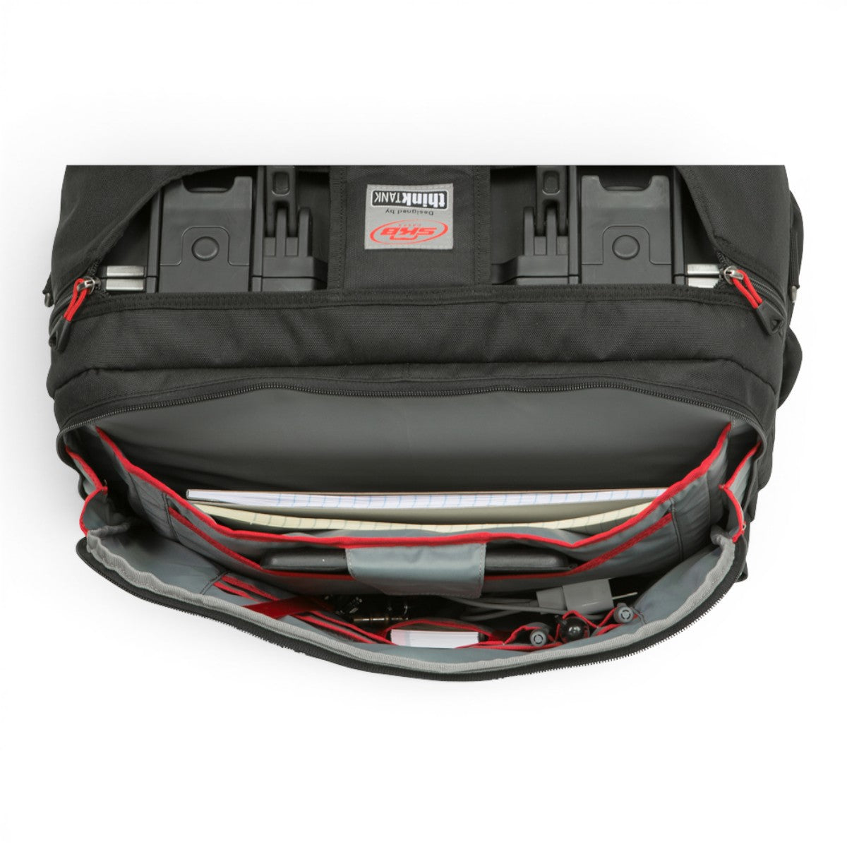 SKB Cases iSeries 1510-6 Think Tank case cover with open front pocket showing organized storage for laptop and gear.