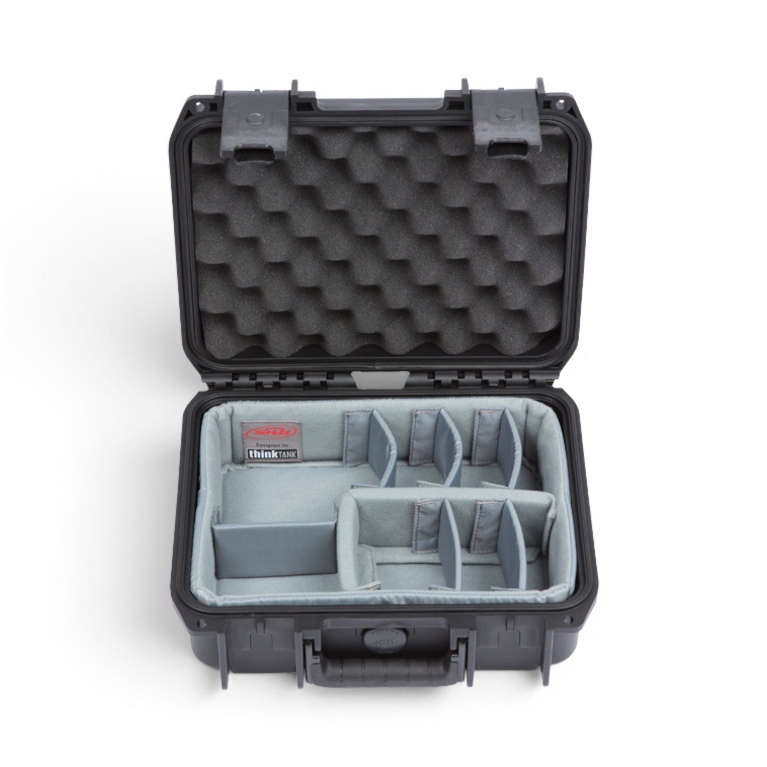 SKB Cases iSeries 1209-4 waterproof hard case with grey padded interior dividers and egg-crate foam lid lining.