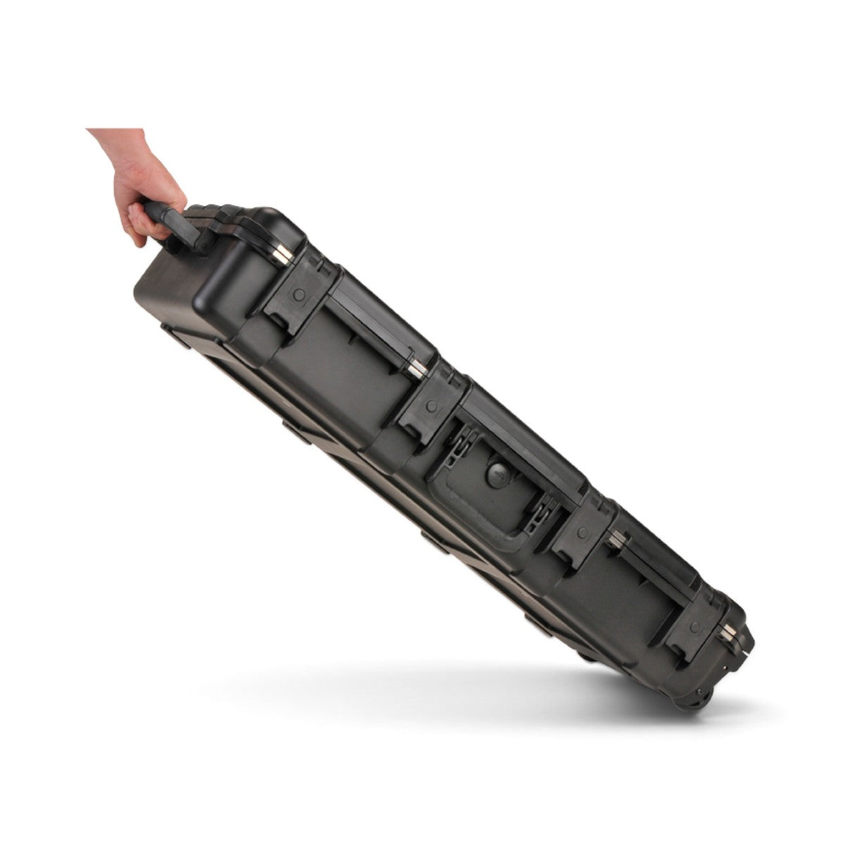 SKB Cases iSeries 3614-6 black waterproof breakdown shotgun case with a hand holding the rubber over-molded handle.