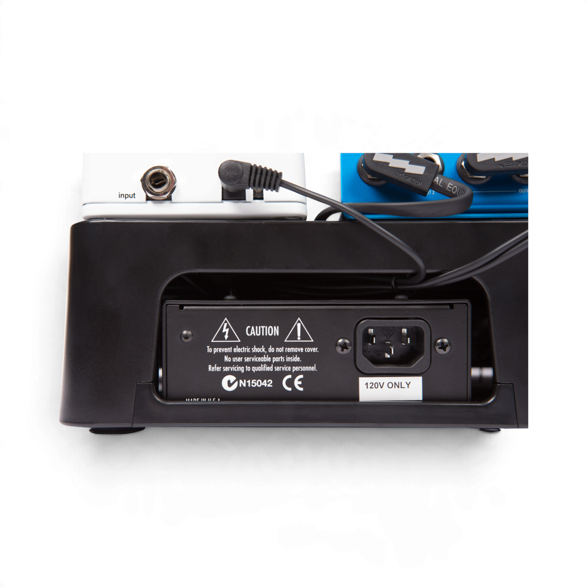 SKB Cases injection molded pedalboard showing rear power supply mounting area with cable connections
