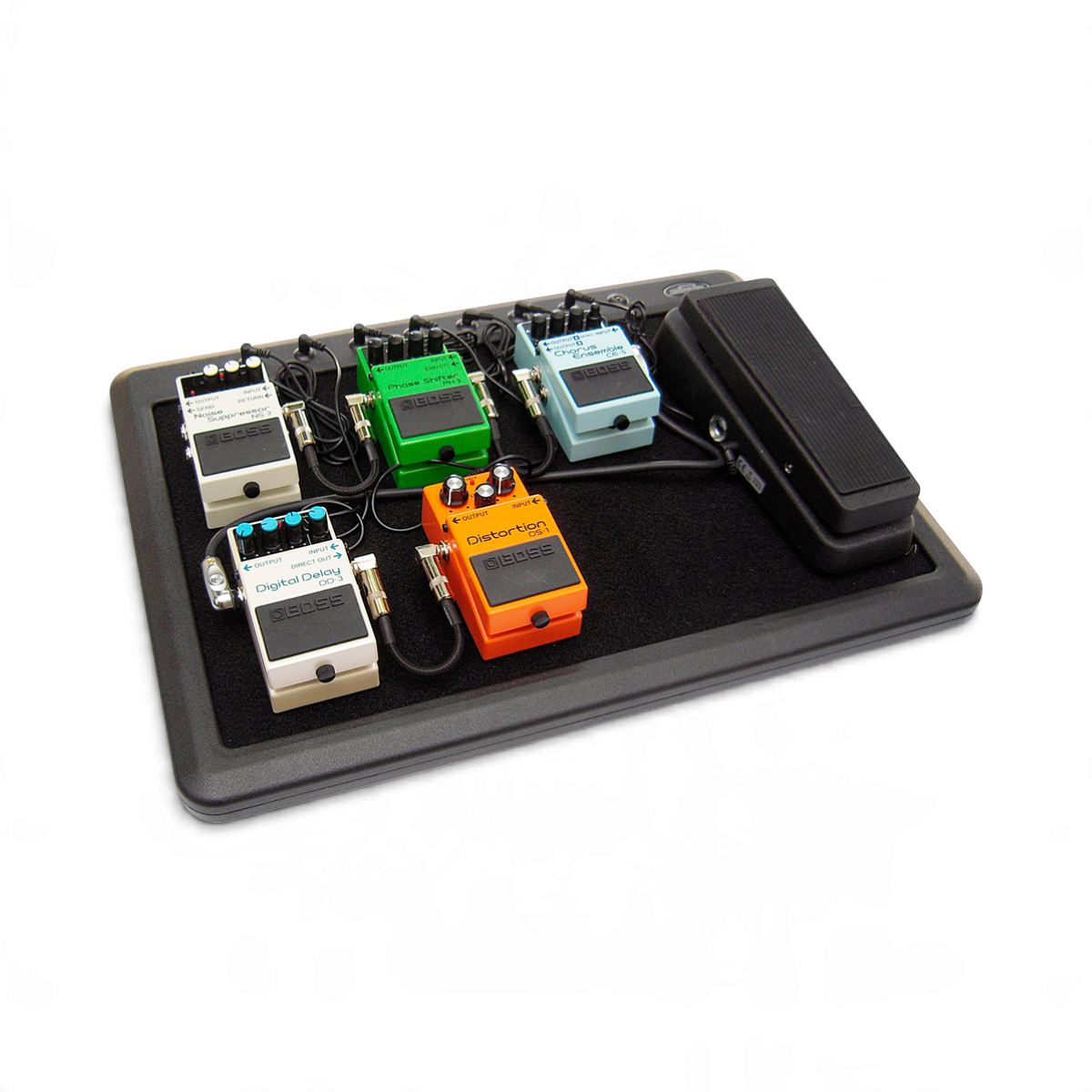SKB Cases 1SKB-PS-8 powered pedalboard with five guitar effect pedals and a wah pedal mounted on a black surface