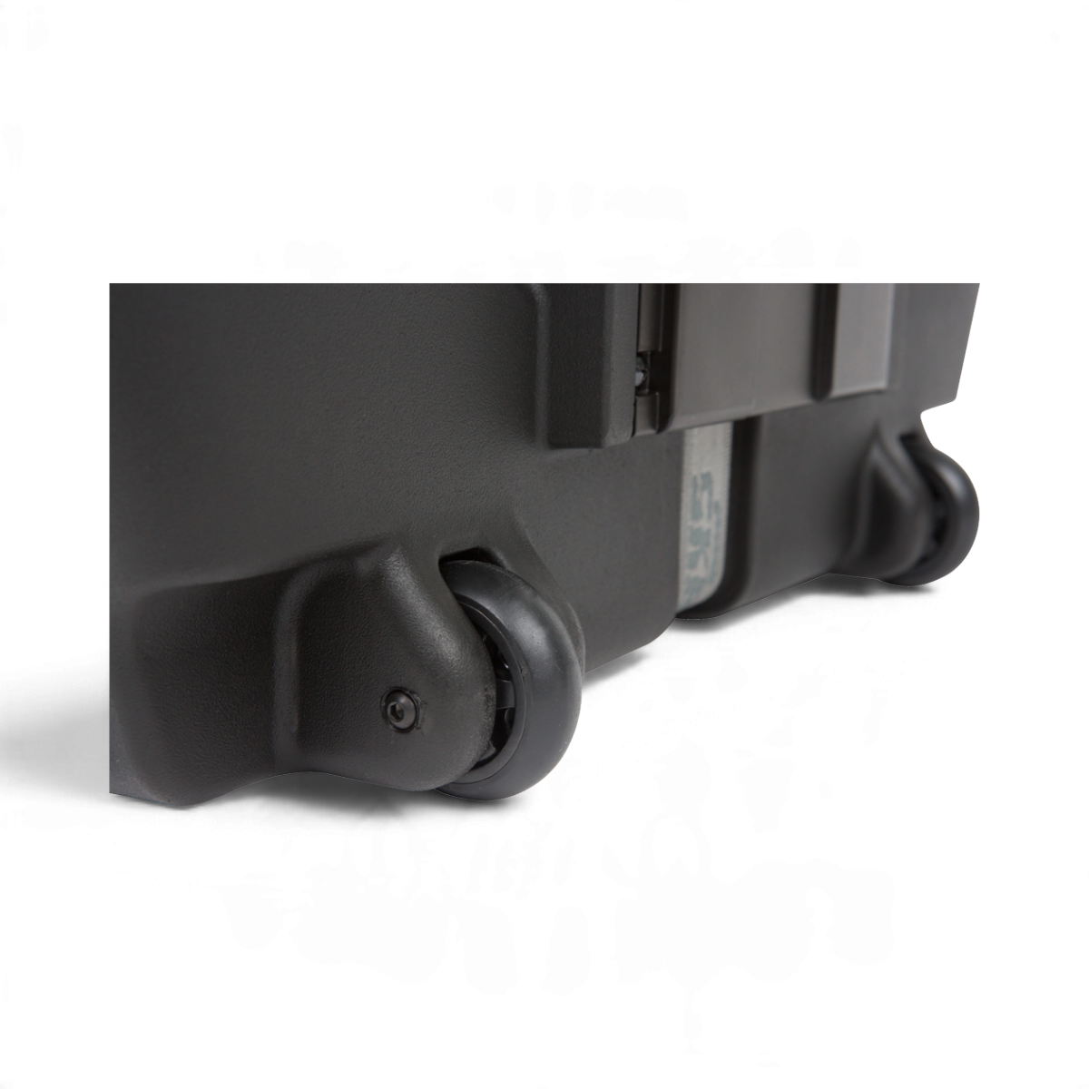 Close-up of the durable black wheels on an SKB Cases Rolling Cymbal Vault, showing the rugged Roto-molded base.