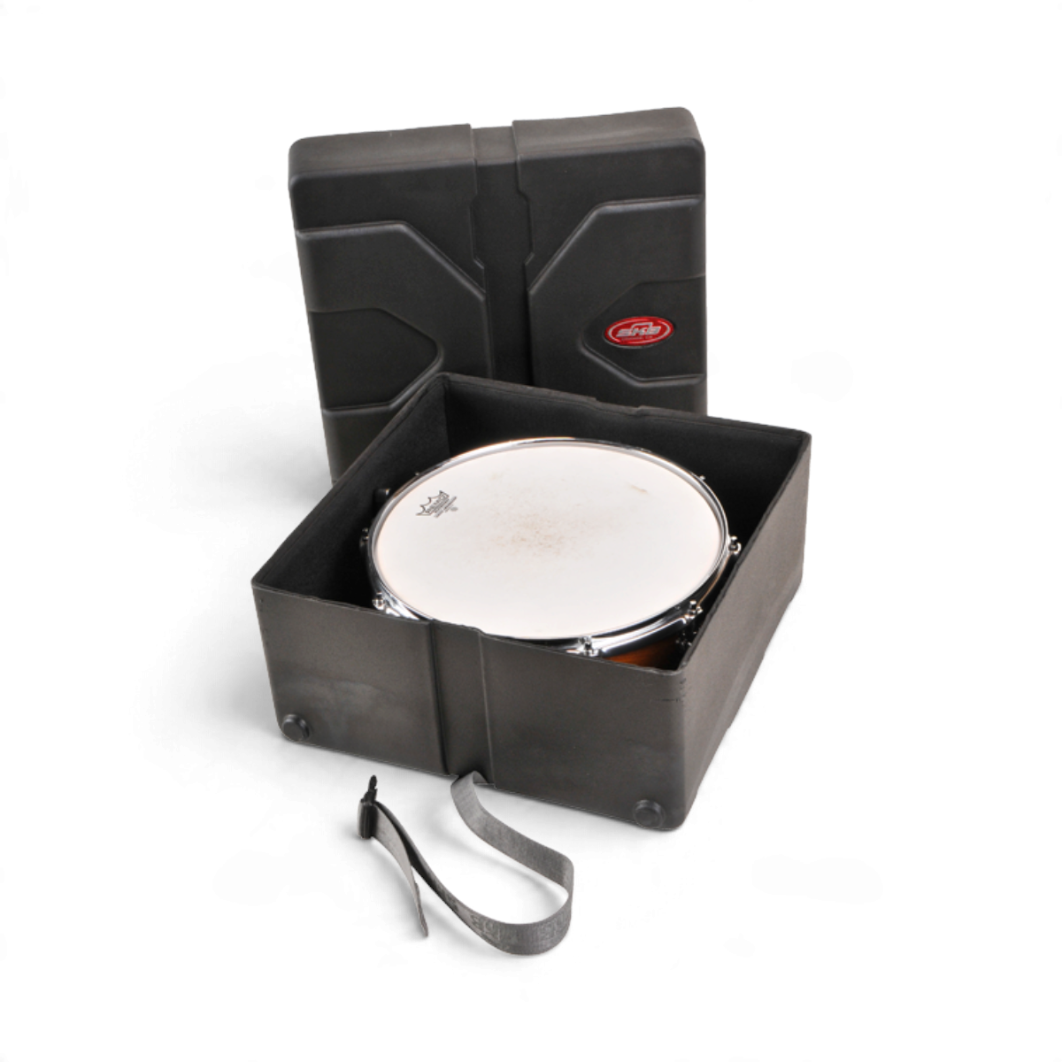 SKB Cases Roto snare drum case in black with Roto-X pattern, featuring a padded interior and secure strap closure.