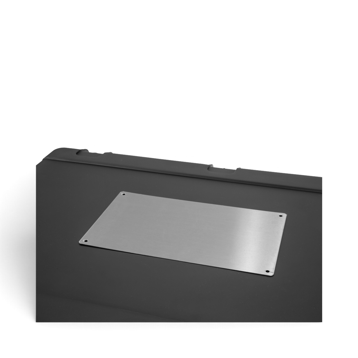 SKB Cases 12x7 inch silver metal shipping label plate with adhesive backing mounted on a black case surface