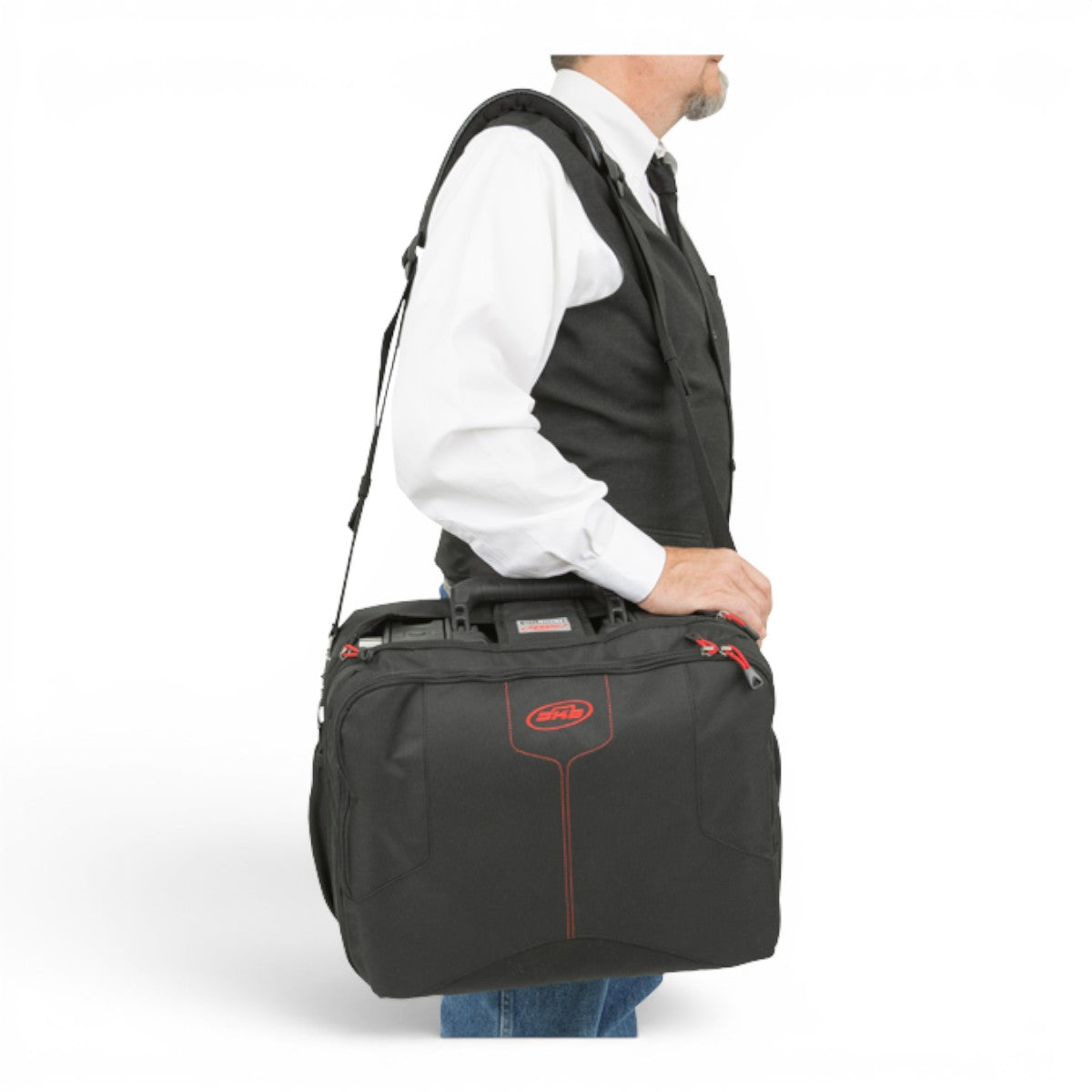 SKB Cases iSeries 1510-6 Think Tank designed black protective case cover with shoulder strap worn by a person