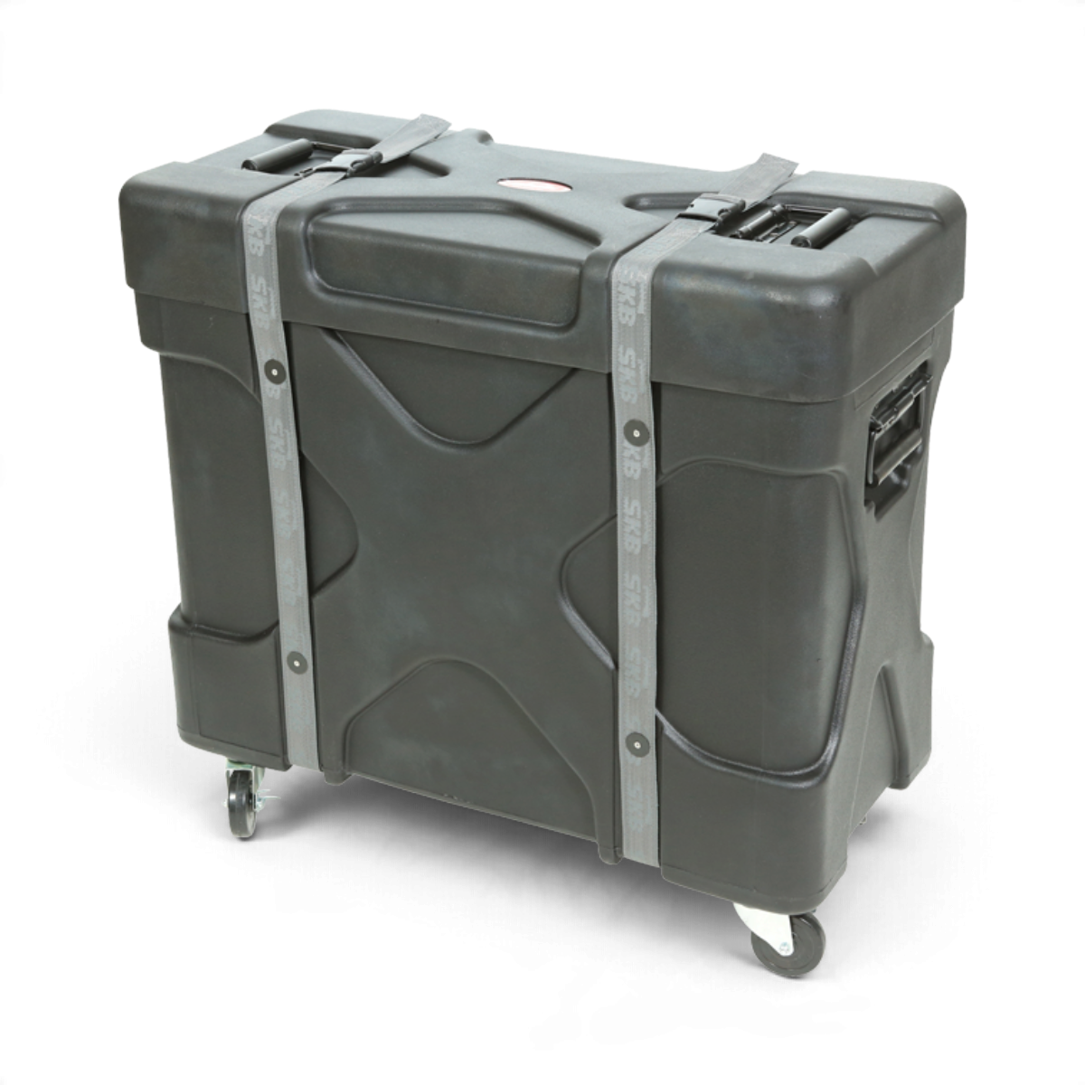 SKB Cases Trap X2 roto-molded black drum transport case with heavy-duty straps, casters, and X-pattern reinforcement.