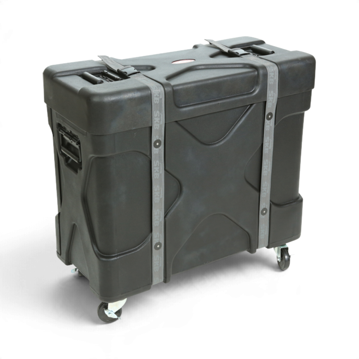 SKB Cases Trap X2 roto-molded black drum case with heavy-duty straps, casters, and X-pattern reinforced design.