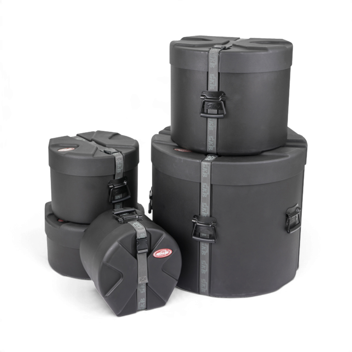 SKB Cases Ultimate Drum Package featuring five black Roto-X molded drum cases with secure straps and protective lids.